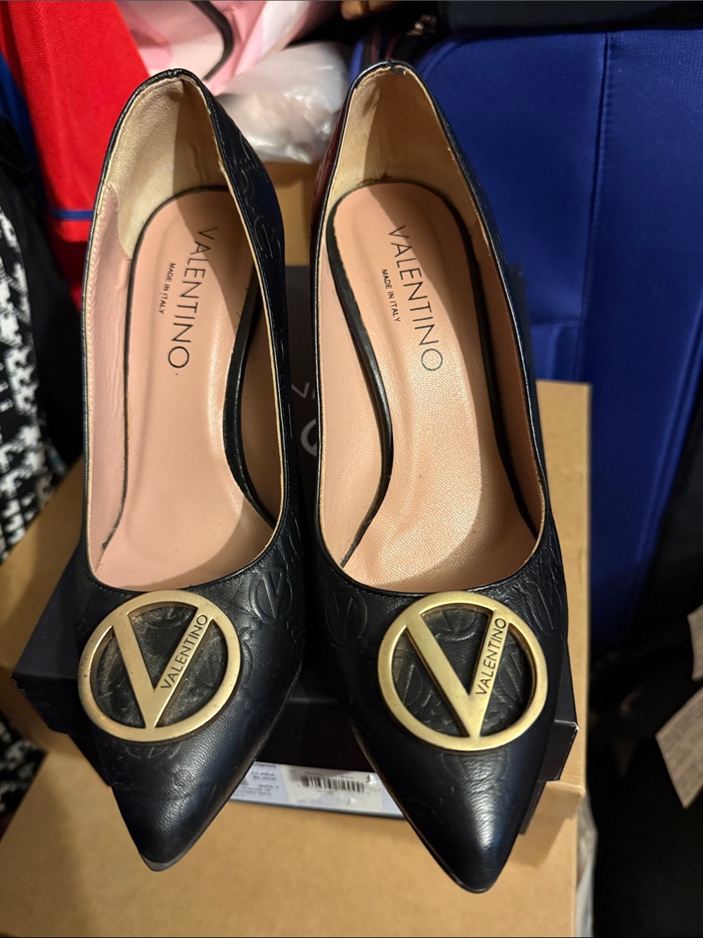 Valentino Black Leather Pointed-Toe Heels with Gold Logo Emblem
